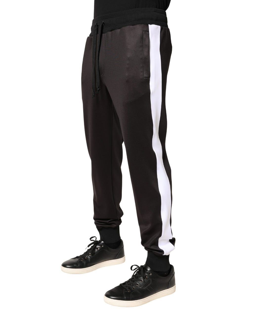 Pantalon jogger skinny en polyester brun Dolce & Gabbana, coupe ajustée, détails modernes, vue de face.