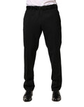 Pantalon homme Dolce & Gabbana en laine noire, coupe skinny, style élégant et moderne, visible sur le mannequin.