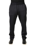 Pantalon jogger skinny en polyester noir de Dolce & Gabbana, coupe ajustée et détails modernes.