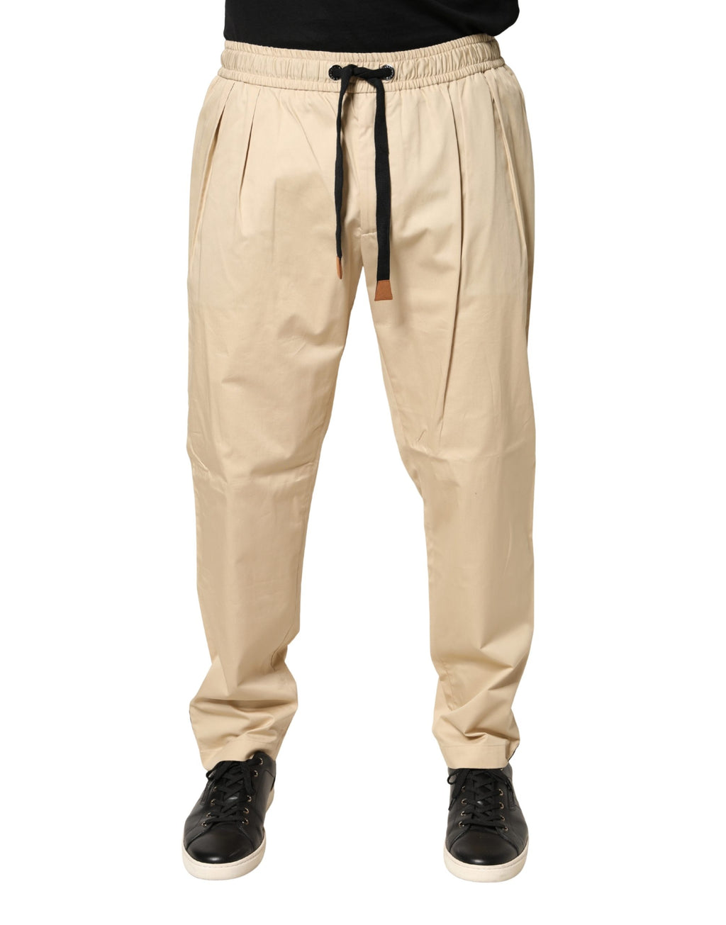 Pantalon jogger homme Dolce & Gabbana beige en coton skinny, pantalon confortable et élégant pour homme.