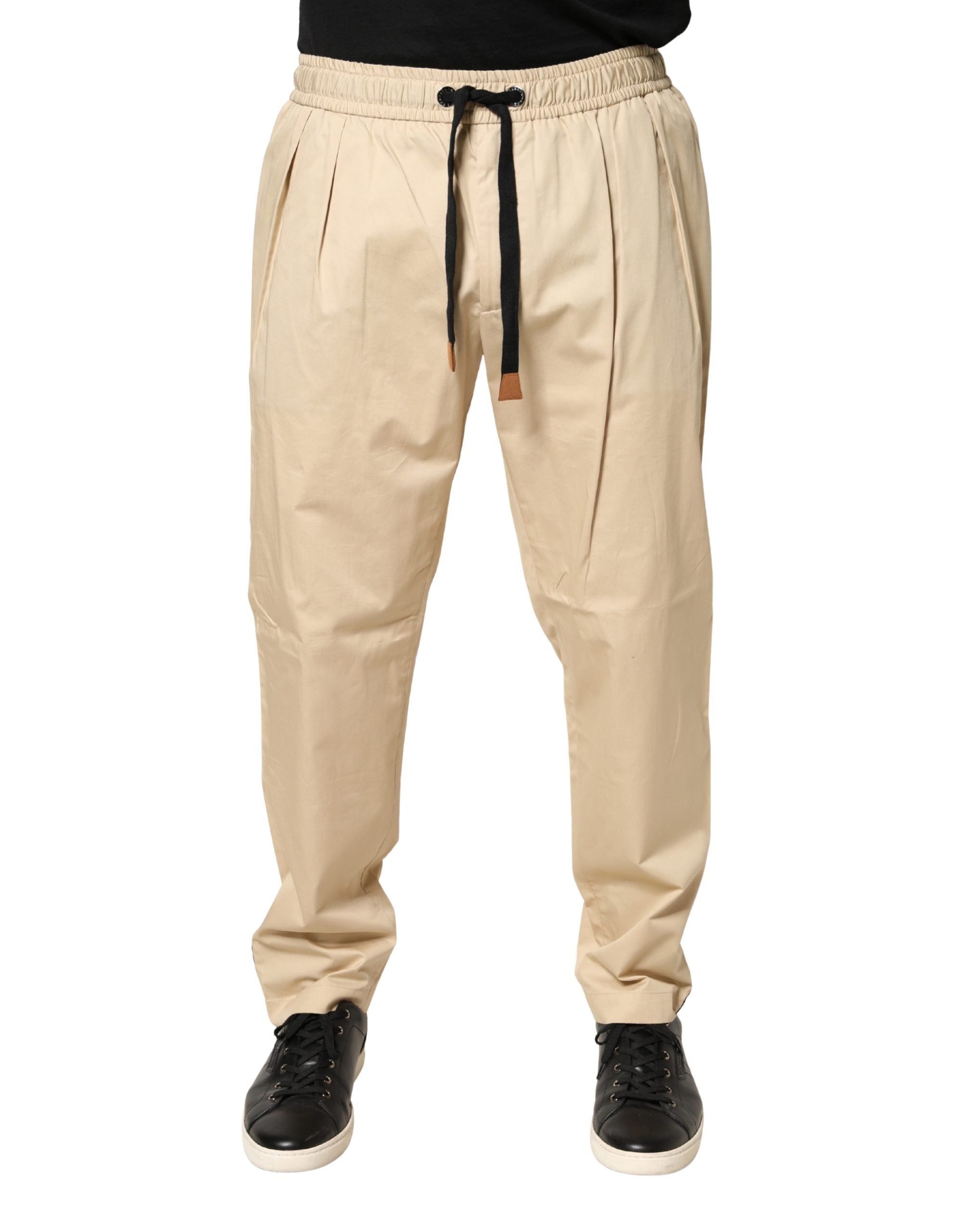 Pantalon jogger homme Dolce & Gabbana beige en coton skinny, pantalon confortable et élégant pour homme.