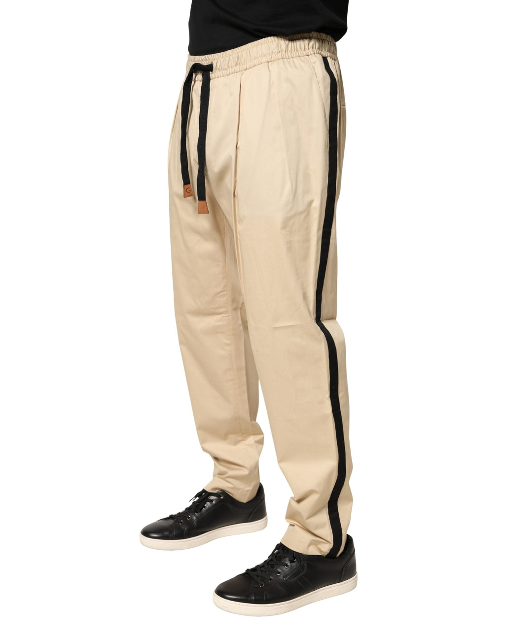 Pantalon jogger slim en coton beige pour homme de Dolce & Gabbana, style décontracté et confortable.