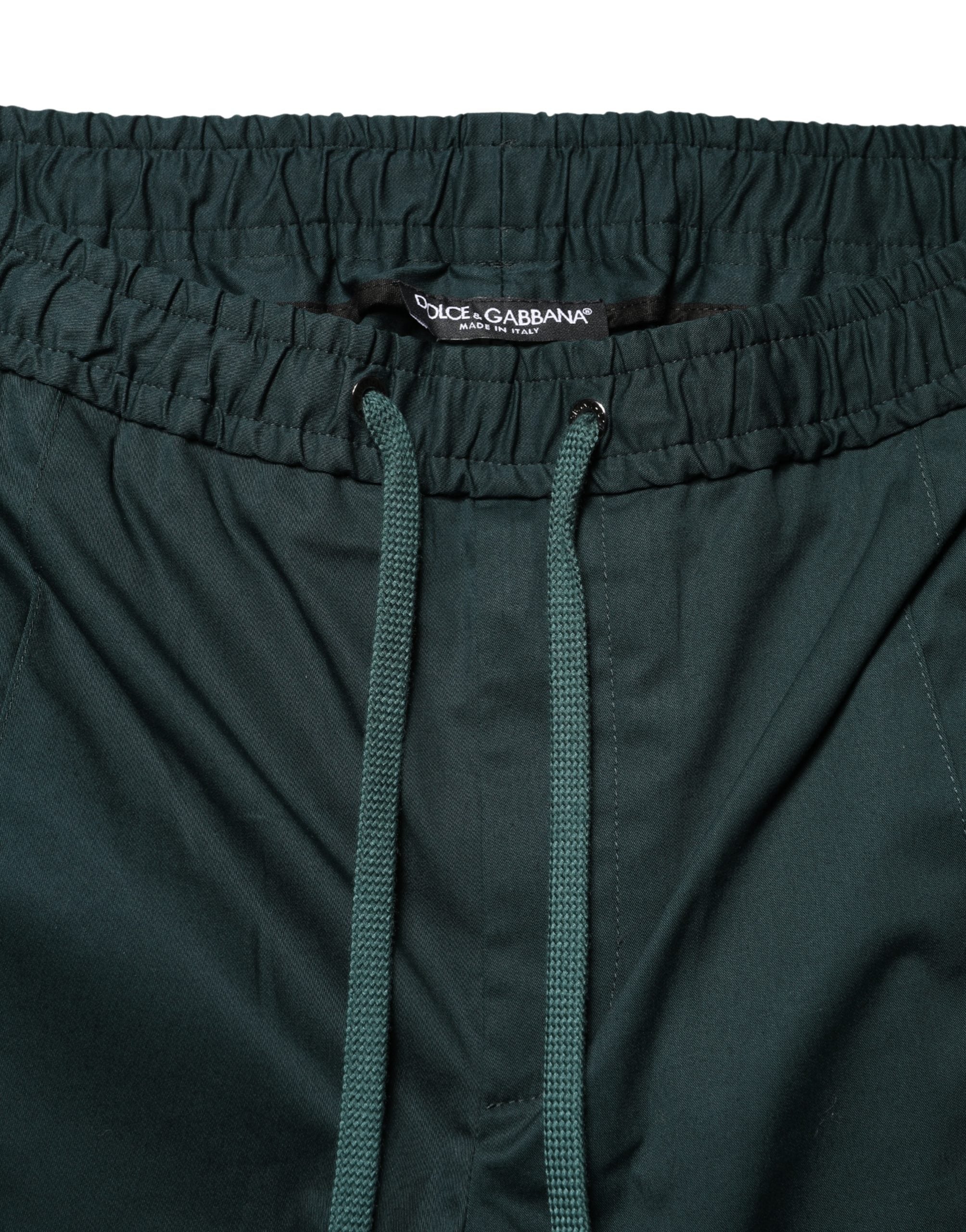 Pantalon slim en coton vert pour homme de Dolce & Gabbana, jogger ajusté avec ceinture élastique et poches latérales.