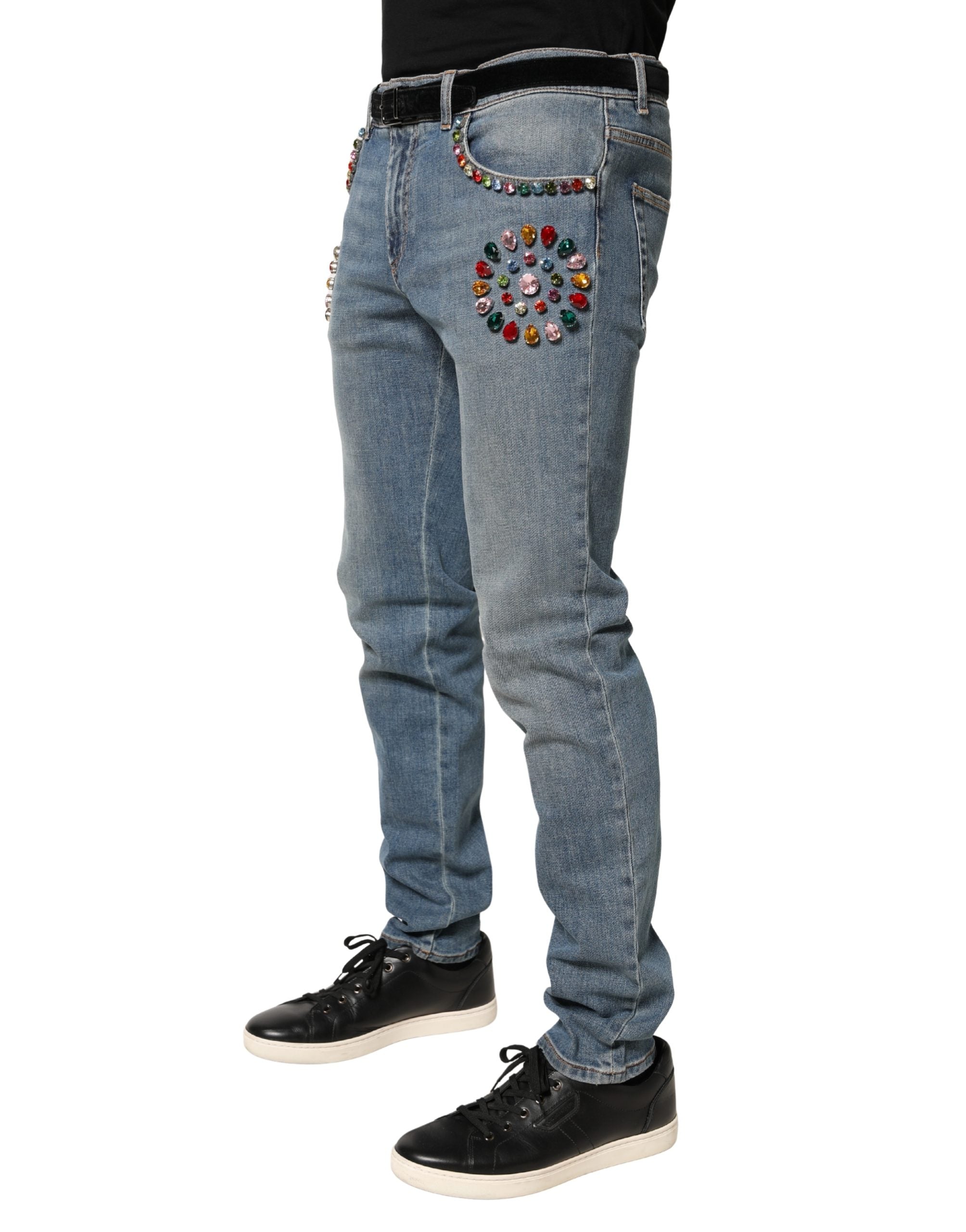 Jeans homme en denim bleu de Dolce & Gabbana avec embellissements, coupe loose en coton, style décontracté et tendance.