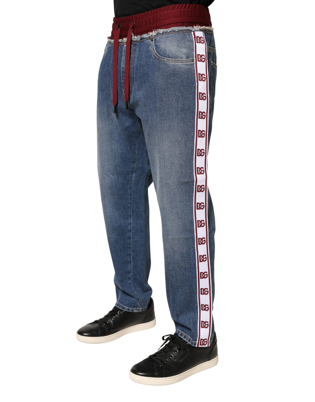 Jeans en denim bleu Dolce & Gabbana avec cordon de serrage et coupe droite, en coton, visible sur l'image.