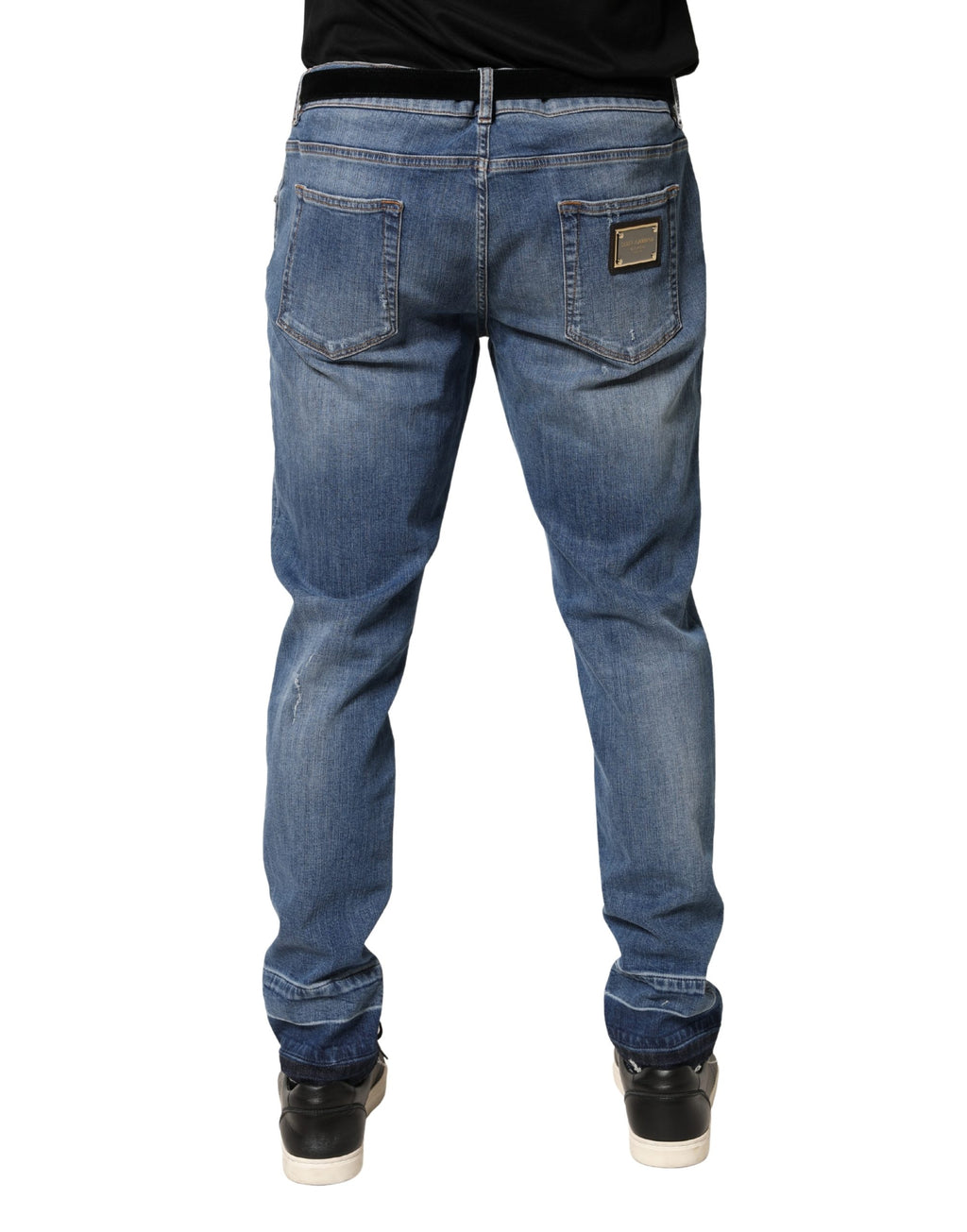 Jeans skinny en coton déchiré bleu de Dolce & Gabbana, style décontracté avec détails usés et coupe ajustée.