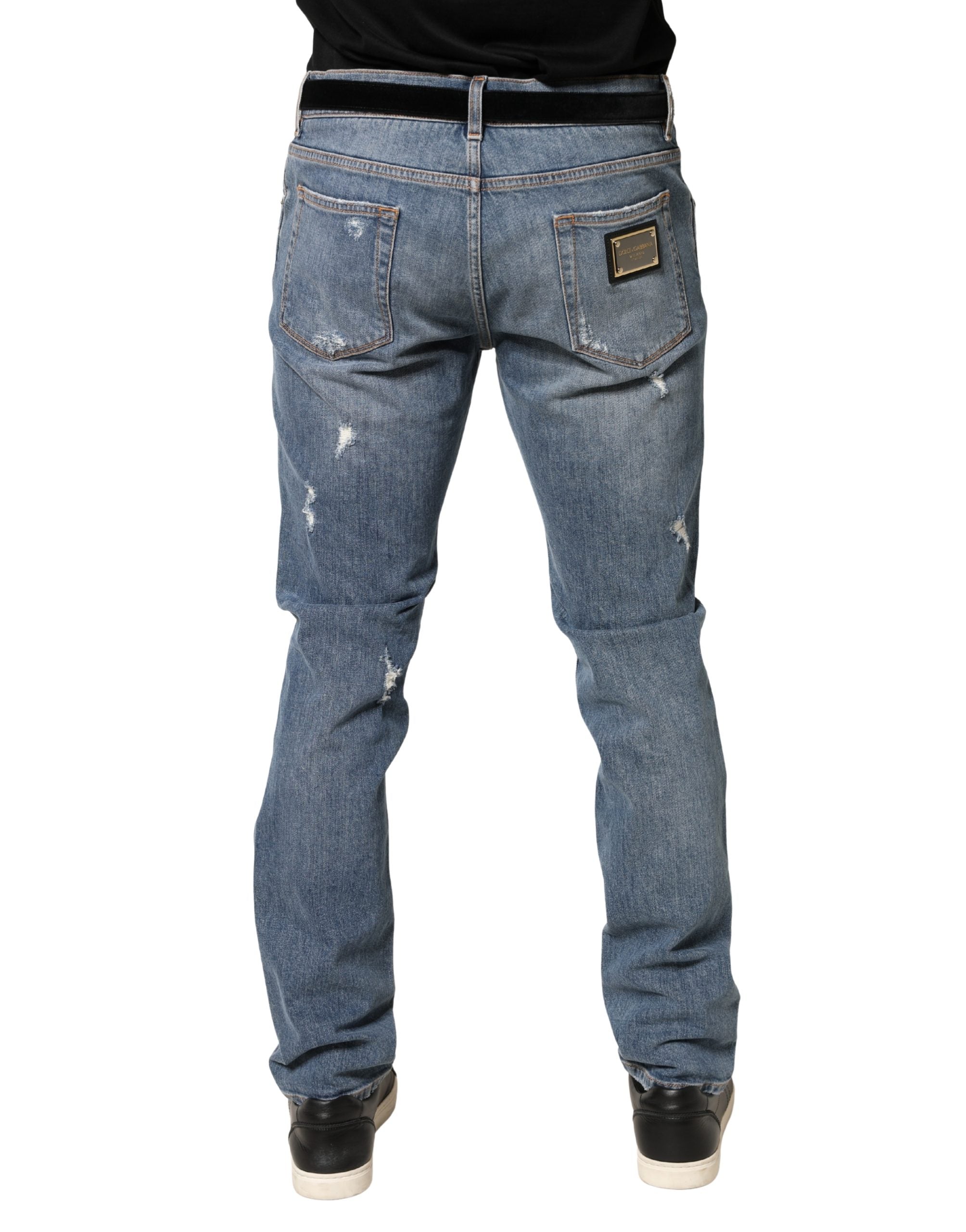 Jeans en denim blanc tacheté Dolce & Gabbana Slim Fit en coton avec déchirures, style décontracté et moderne.