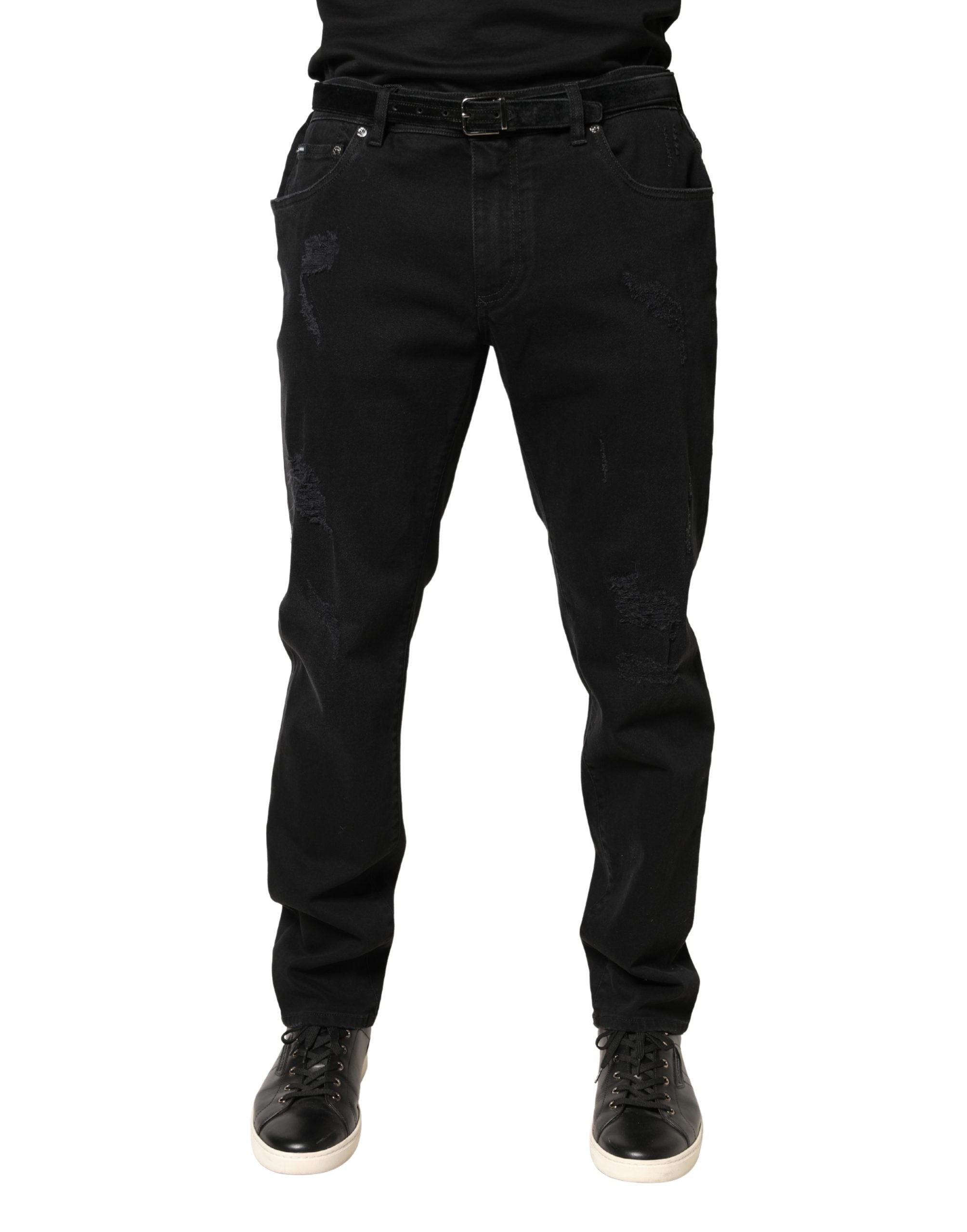 Jeans slim noirs en denim coton tissé déchiré par Dolce & Gabbana, style skinny et tendance.