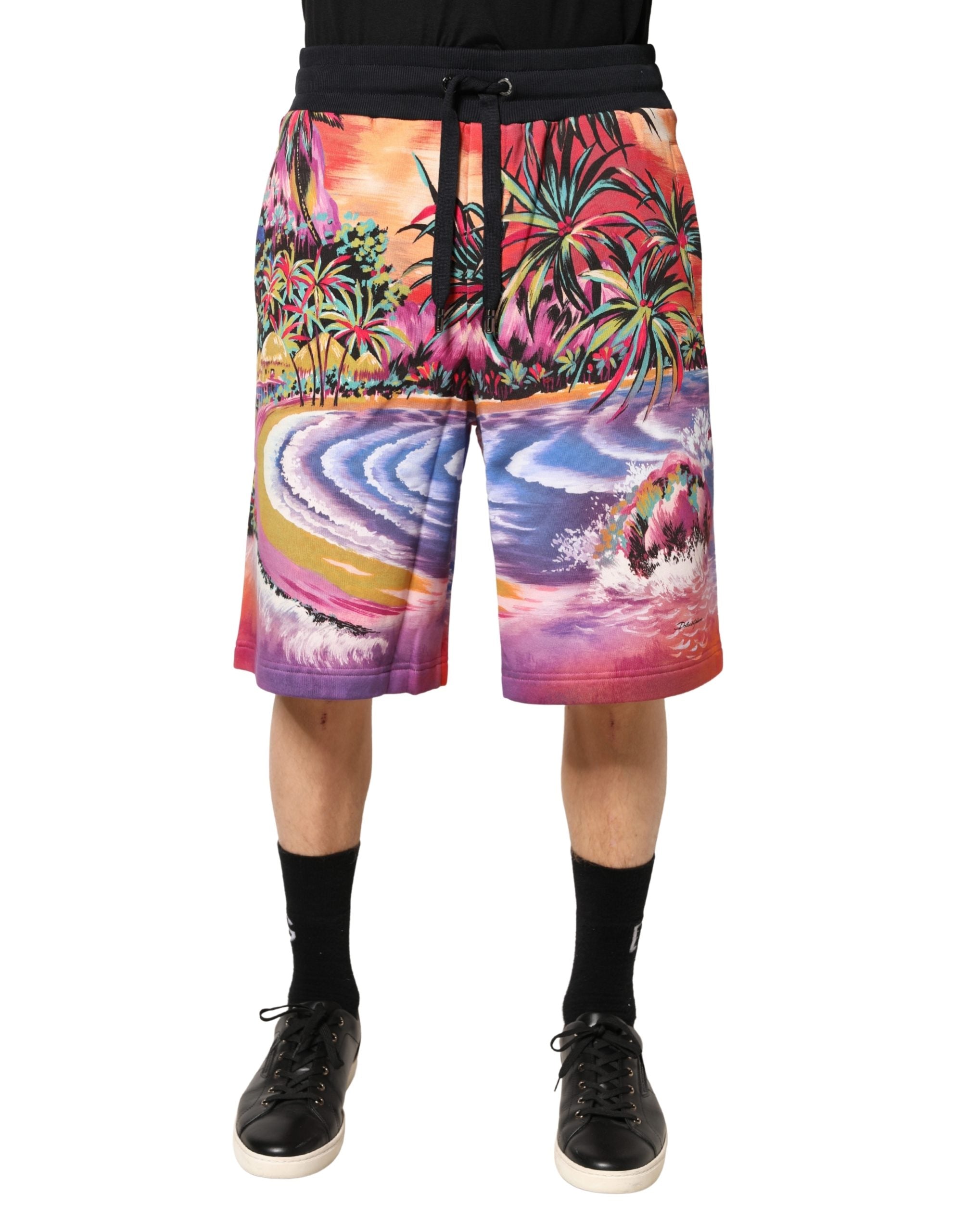 Shorts bermuda en coton imprimé graphique multicolore de Dolce & Gabbana, vue de face, détails colorés et design vibrant.