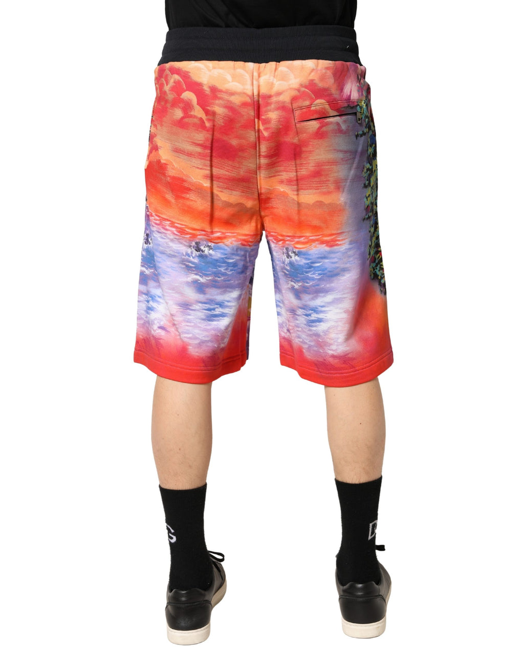 Shorts bermuda en coton à imprimé graphique multicolore de Dolce & Gabbana, avec design vibrant et coloré.