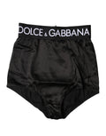 Culotte haute Dolce & Gabbana en dentelle noire avec logo, design élégant et ajusté, vue de face sur fond blanc.