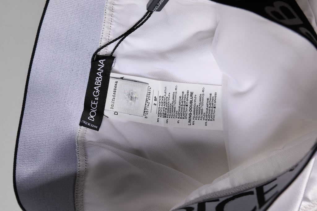 Culotte blanche Dolce & Gabbana logo, taille haute, en coton doux, sous-vêtements élégants et confortables.