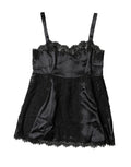 Haut de lingerie en soie noire Dolce & Gabbana avec bordure en dentelle, détails délicats et finition élégante.