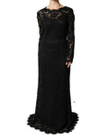 Robe longue en coton noir avec dentelle et manches longues, de la marque Dolce & Gabbana, pour un style élégant et sophistiqué.