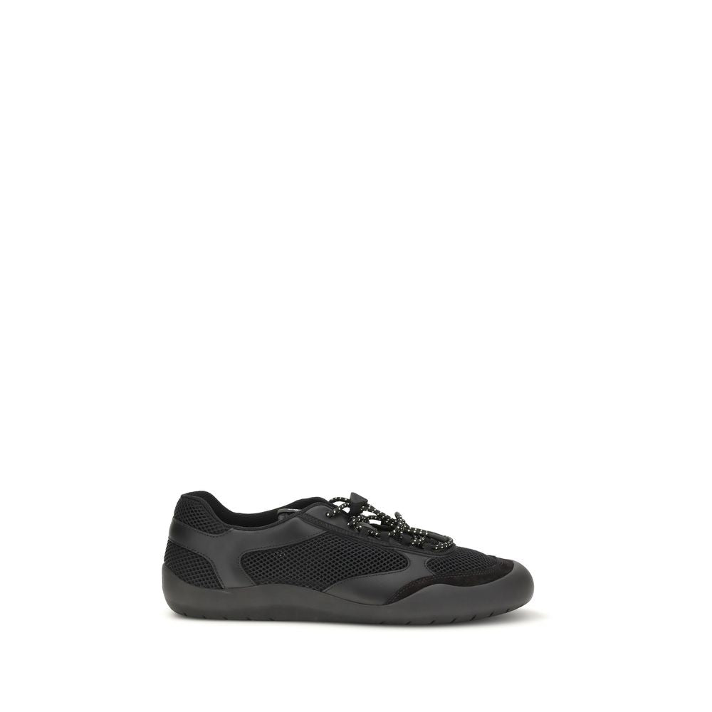 Chaussures de sport Prada en polyester noir, baskets athlétiques modernes avec design élégant et confort.