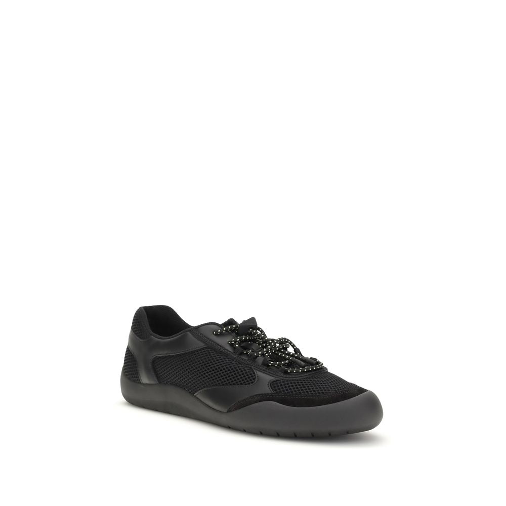 Chaussures de sport Prada en polyester noir, baskets athlétiques élégantes avec semelle blanche, parfaites pour l'activité sportive et le style.