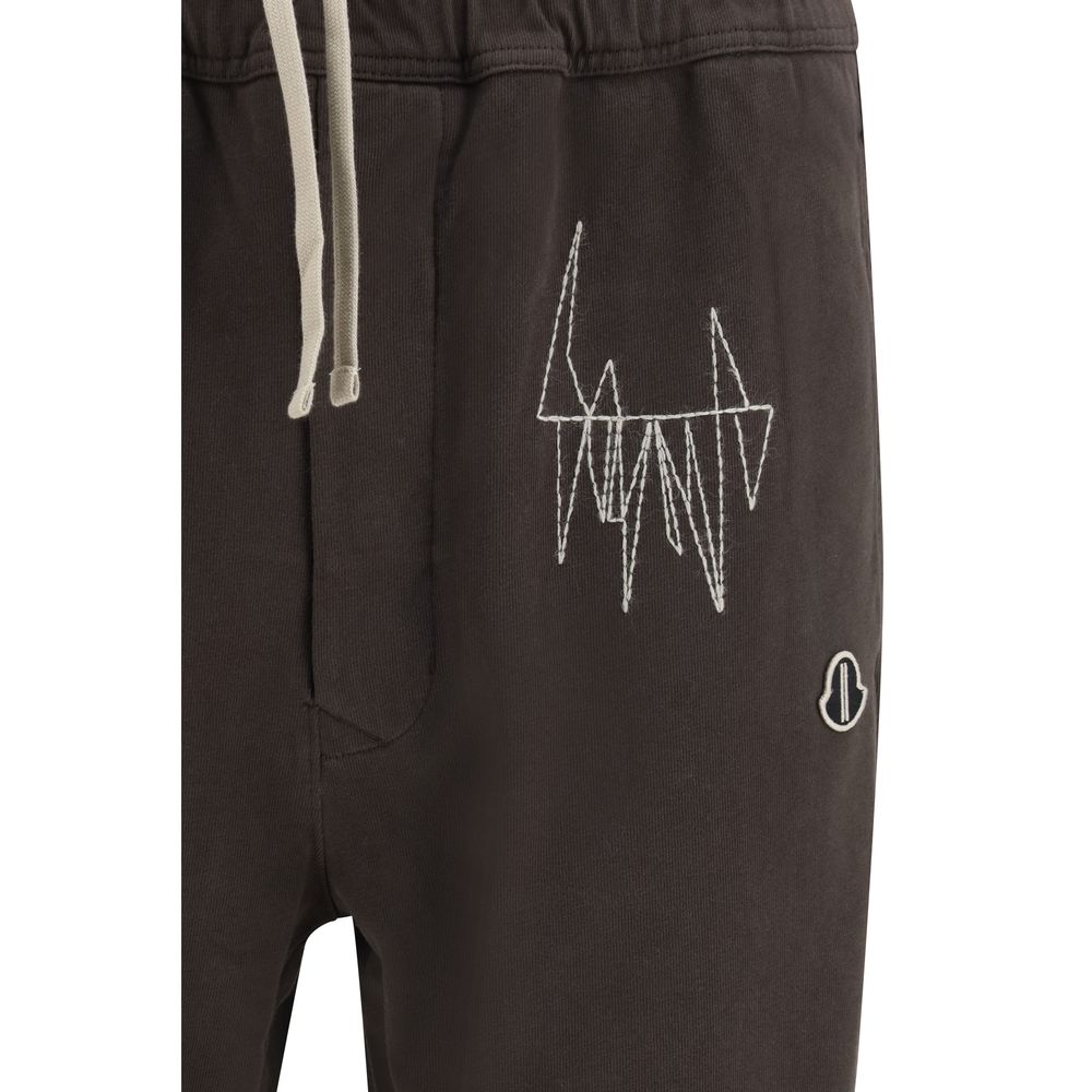Pantalon sportif en coton marron Moncler x Rick Owens, style athlétique avec détails modernes et logo visible.