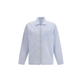 Chemise en nylon bleu à motif de la marque Prada, style élégant et moderne, visible sur le produit.