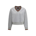 Sweat-shirt gris en coton de Gucci, vêtement décontracté avec logo Gucci visible, porté par un mannequin.