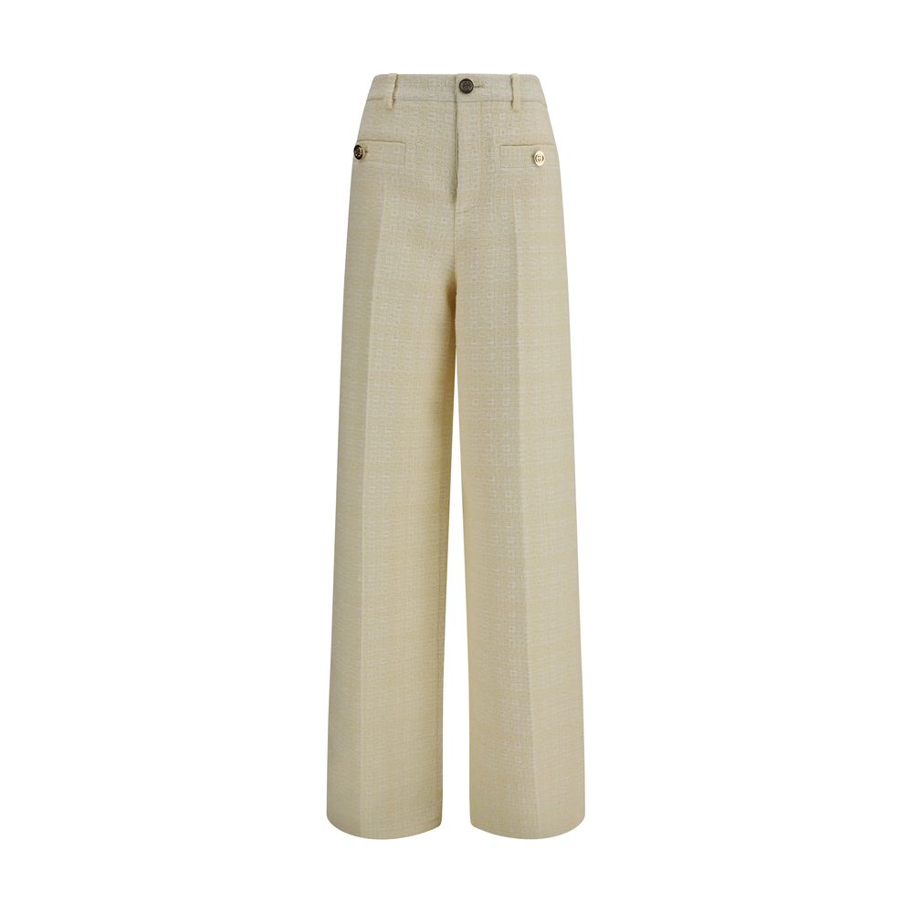 Pantalon beige en coton de Gucci pour homme, style élégant et confortable, avec coupe classique et détails raffinés.