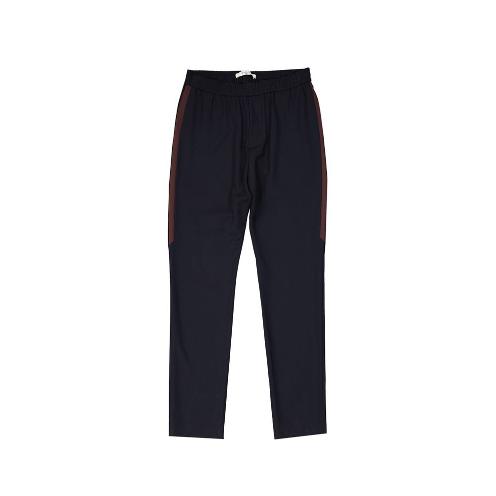 Pantalon décontracté en laine bleue de Givenchy, coupe élégante et tissu doux, porté dans une image de style casual.