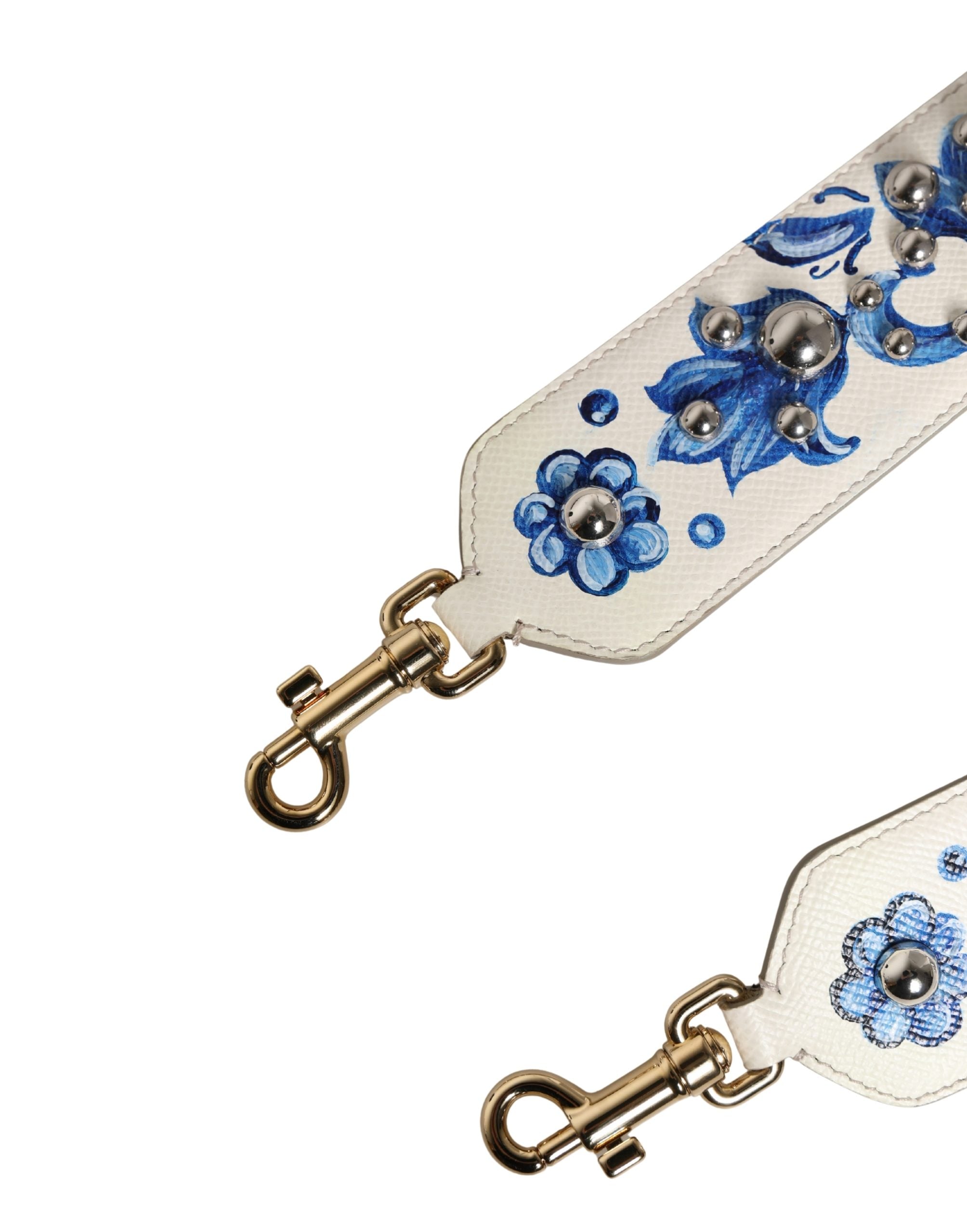Sangle d'accessoire pour shoulder Dolce & Gabbana en cuir blanc et bleu avec fleurs et clous, design élégant et floral.