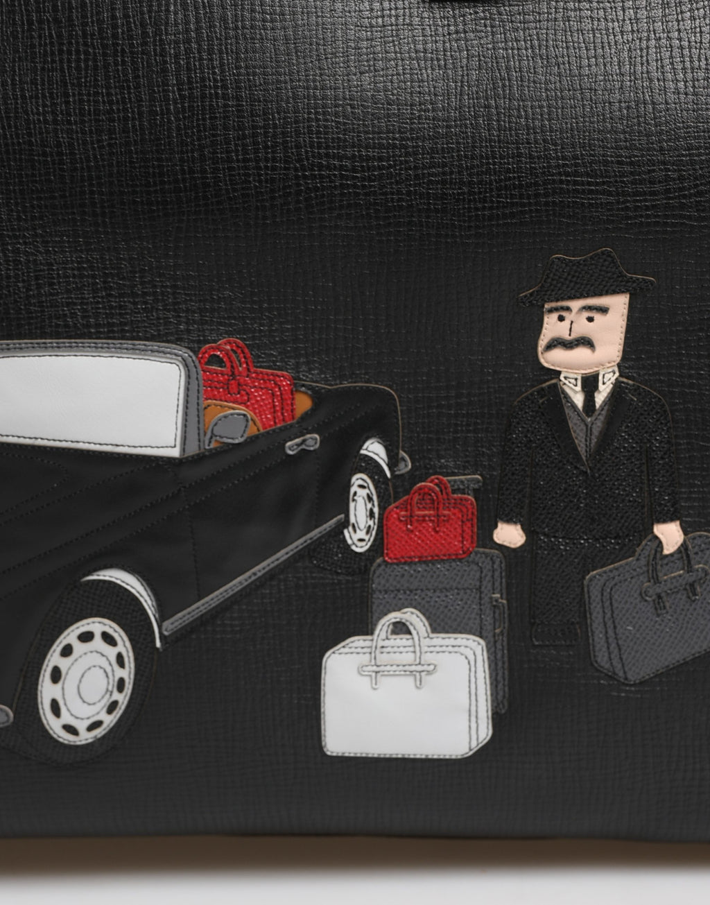 Sac weekender noir Dolce & Gabbana pour homme en cuir avec appliqués et détails élégants, idéal pour les voyages.