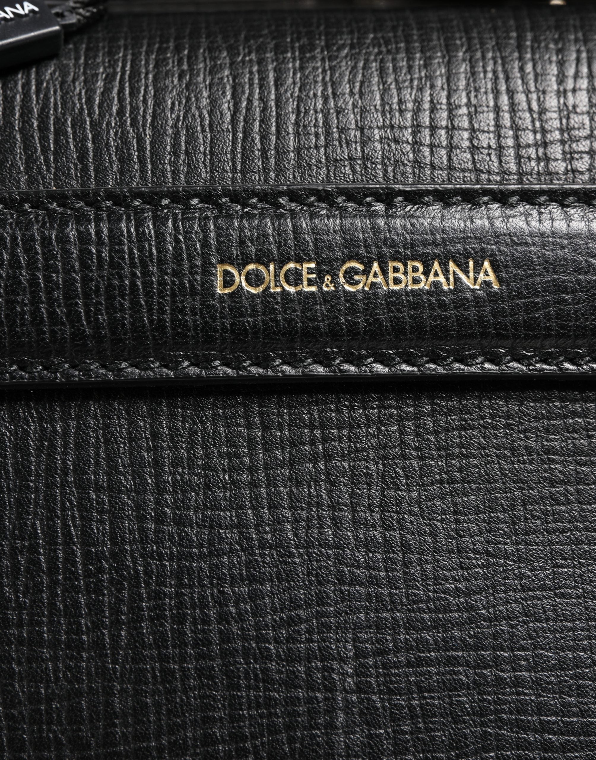 Sac weekender en cuir noir pour homme Dolce & Gabbana, avec appliqué et design élégant, parfait pour voyager.