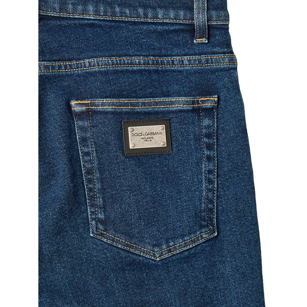 Jean skinny en coton bleu de Dolce & Gabbana, coupe ajustée, détails modernes, visible sur fond neutre.