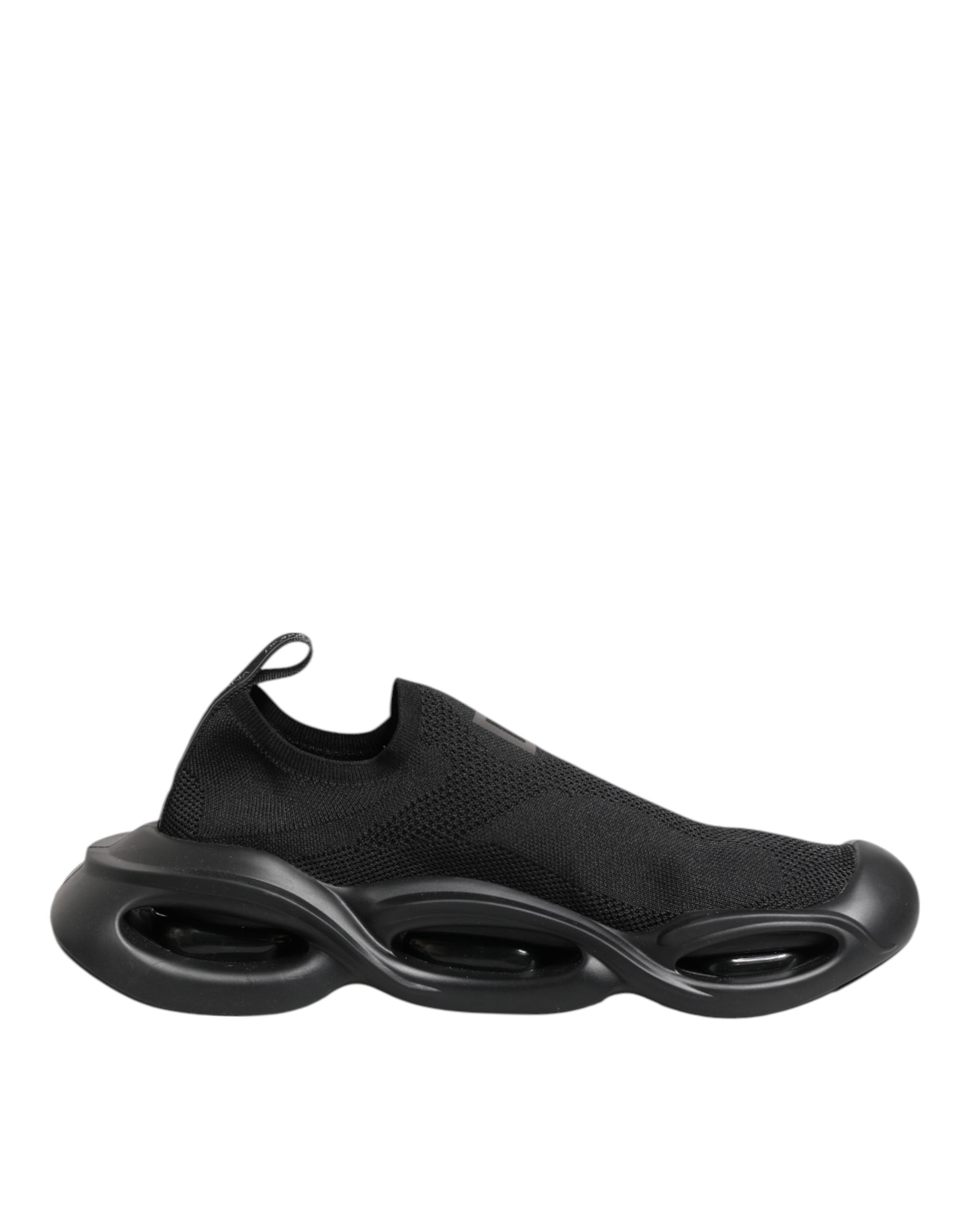 Chaussures Dolce & Gabbana Slip On Wave noires, baskets basses élégantes en cuir avec design moderne, vue de face.