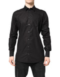 Chemise formelle noire Dolce & Gabbana en coton avec col, détails dorés pour homme, élégante et sophistiquée.