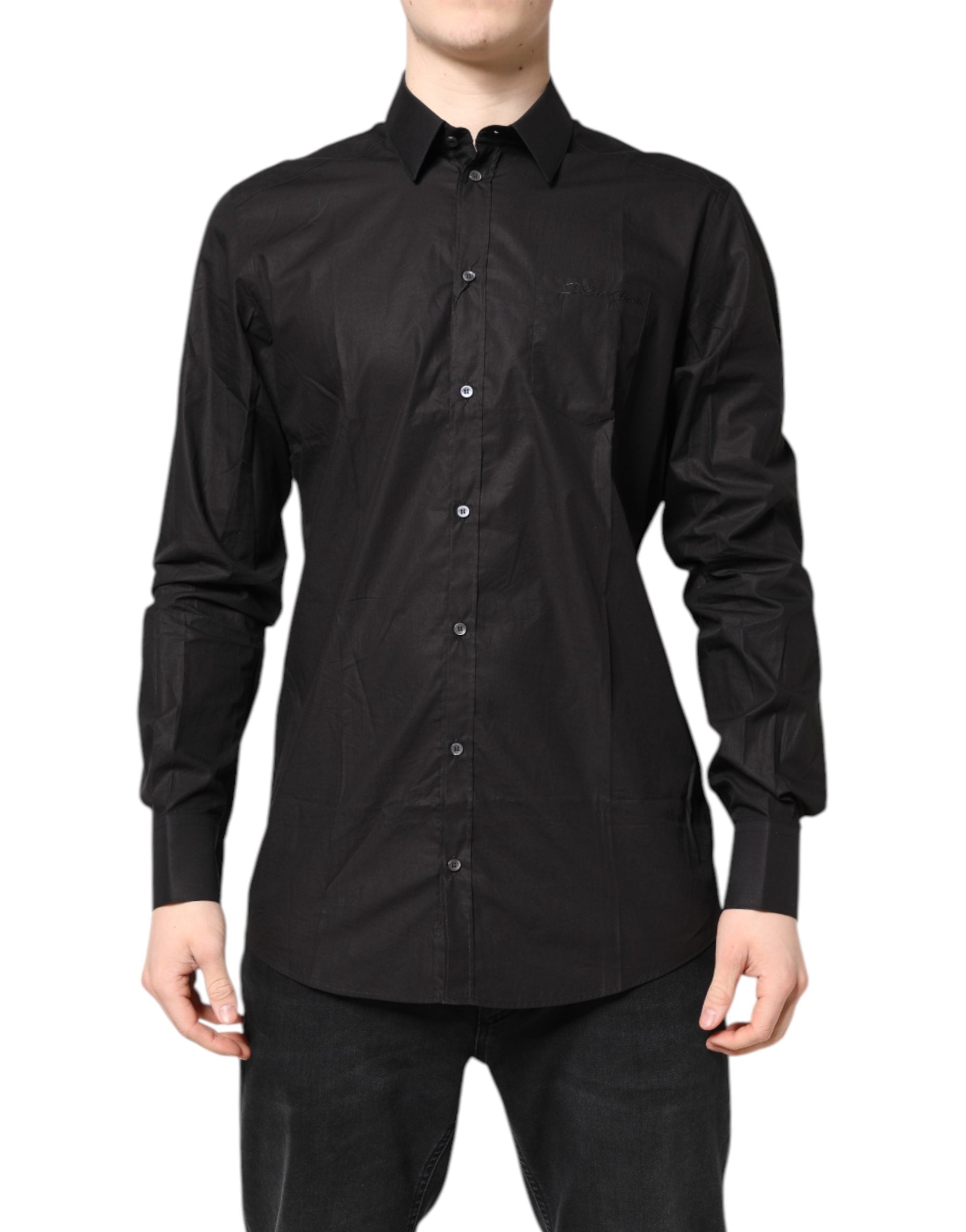 Chemise formelle noire Dolce & Gabbana en coton avec col, détails dorés et design élégant visible sur l'image.