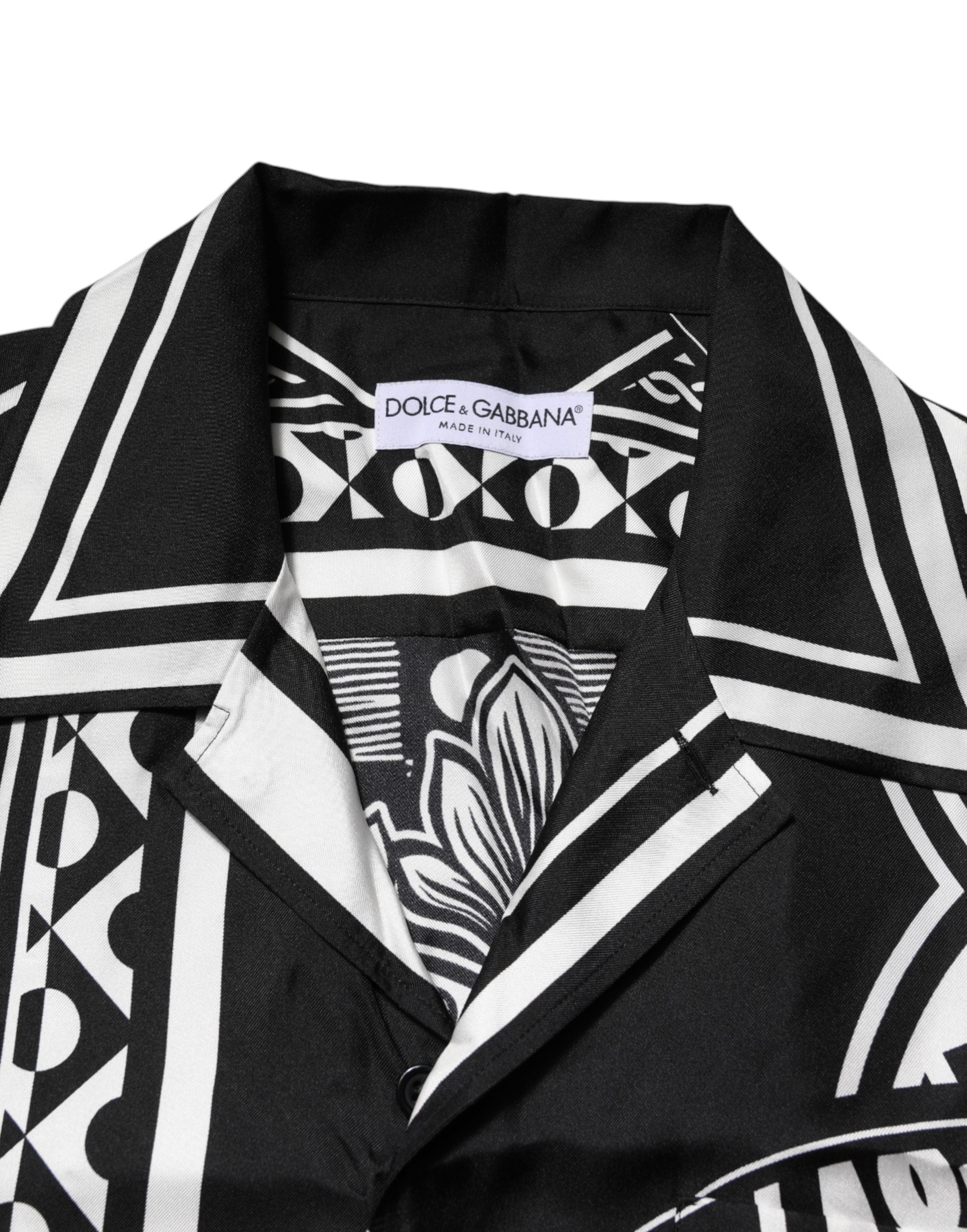 Chemise Dolce & Gabbana en soie noire avec logo imprimé, manches courtes et style élégant.