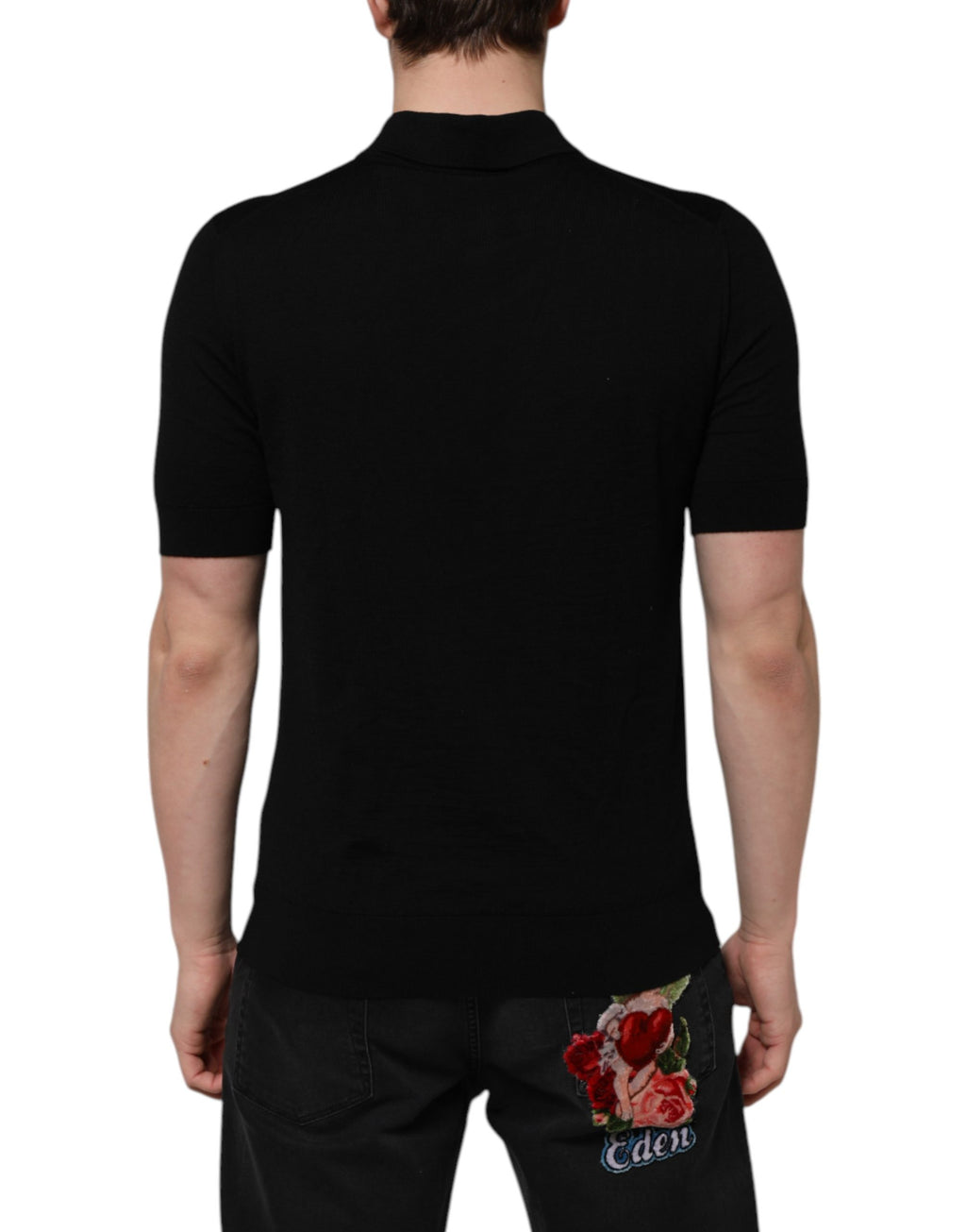 T-shirt à manches courtes Dolce & Gabbana en laine noire avec logo floral, style élégant et design distinctif.