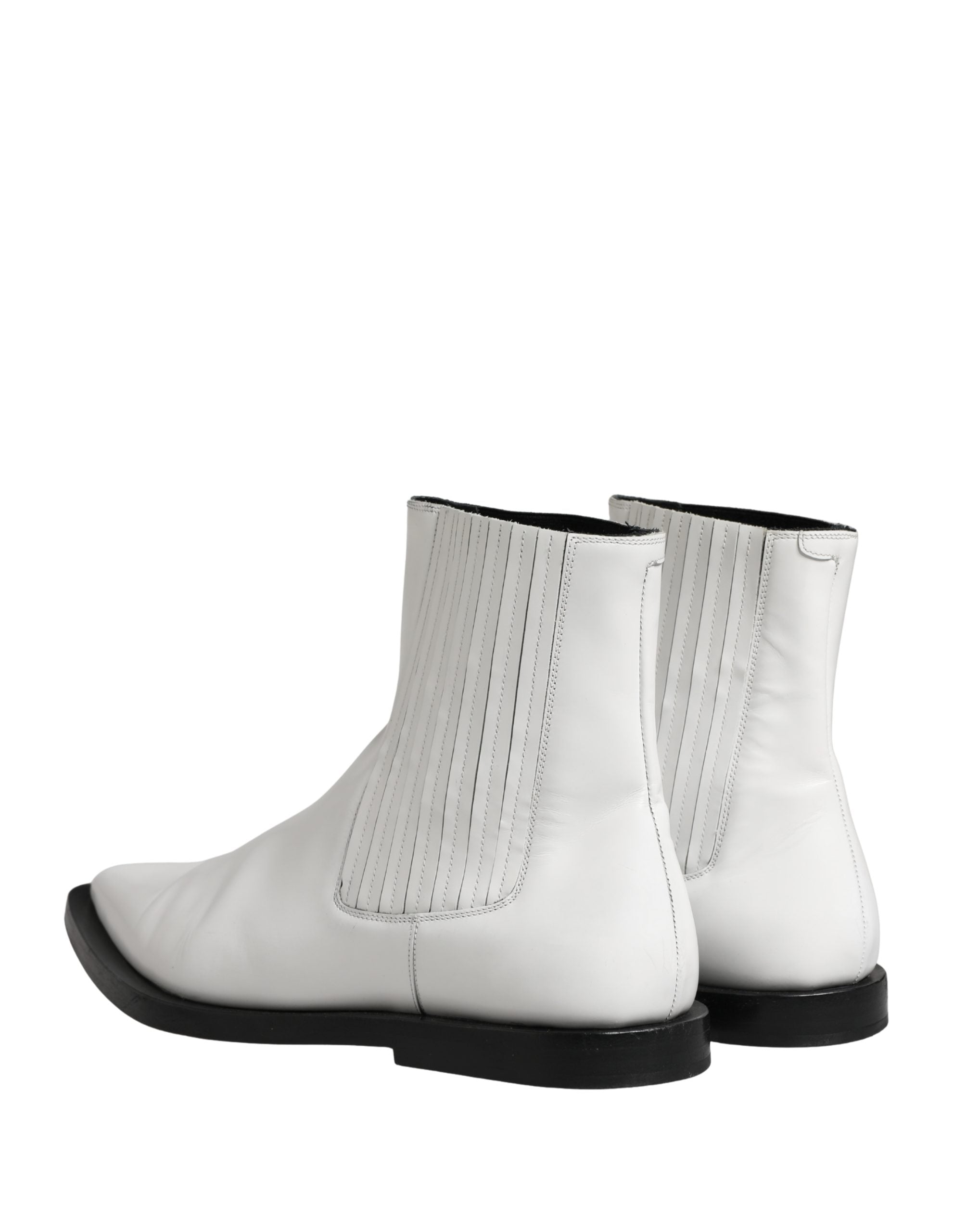 Chaussures bottines Chelsea en cuir blanc de Dolce & Gabbana, slip-on élégantes et confortables pour femme.