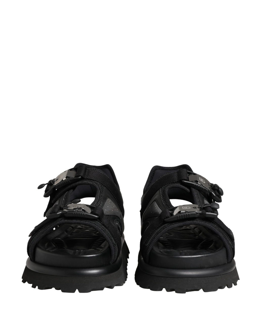 Sandales hommes Dolce & Gabbana noires à logo détaillé, chaussures épaisses et tendance, visibles en gros plan.