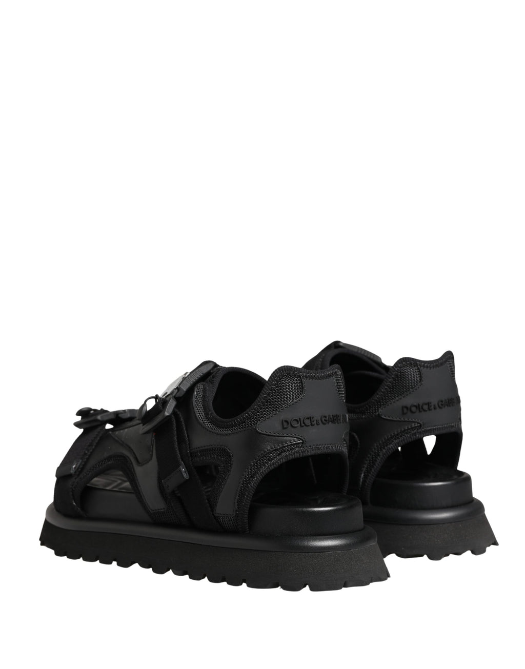 Sandales pour homme Dolce & Gabbana noires avec logo détaillé et semelle épaisse, chaussures de mode élégantes et confortables.