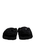 Sandales plates Dolce & Gabbana en fausse fourrure noire avec motif puma, chaussures confortables et élégantes.