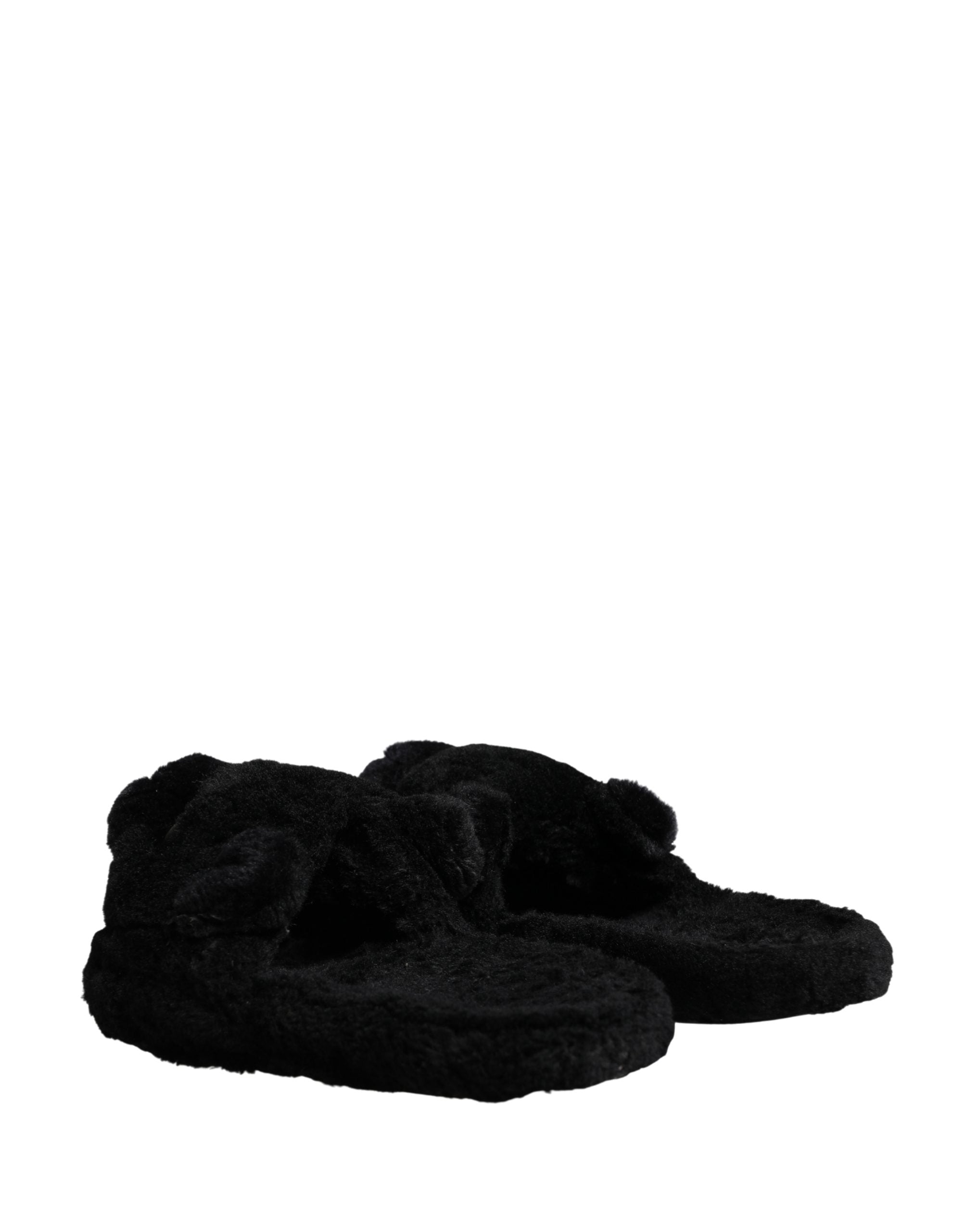 Sandales plates Dolce & Gabbana en fourrure synthétique noire avec motif de panthère, confortables et élégantes.