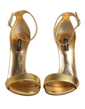 Sandales à talons dorés Dolce & Gabbana Keira en cuir, chaussures élégantes avec bride fine, vue de côté.