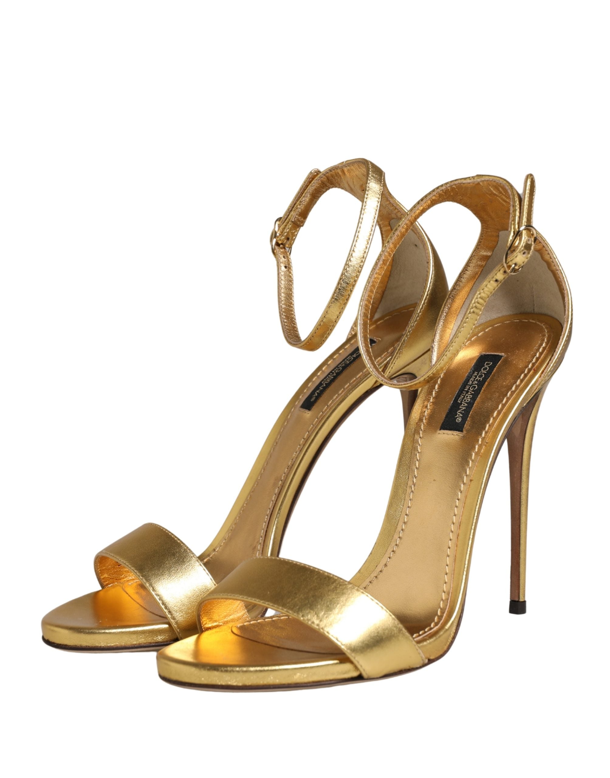 Sandales à talons en cuir doré Dolce & Gabbana Keira, chaussures élégantes à haute semelle, vue de face.