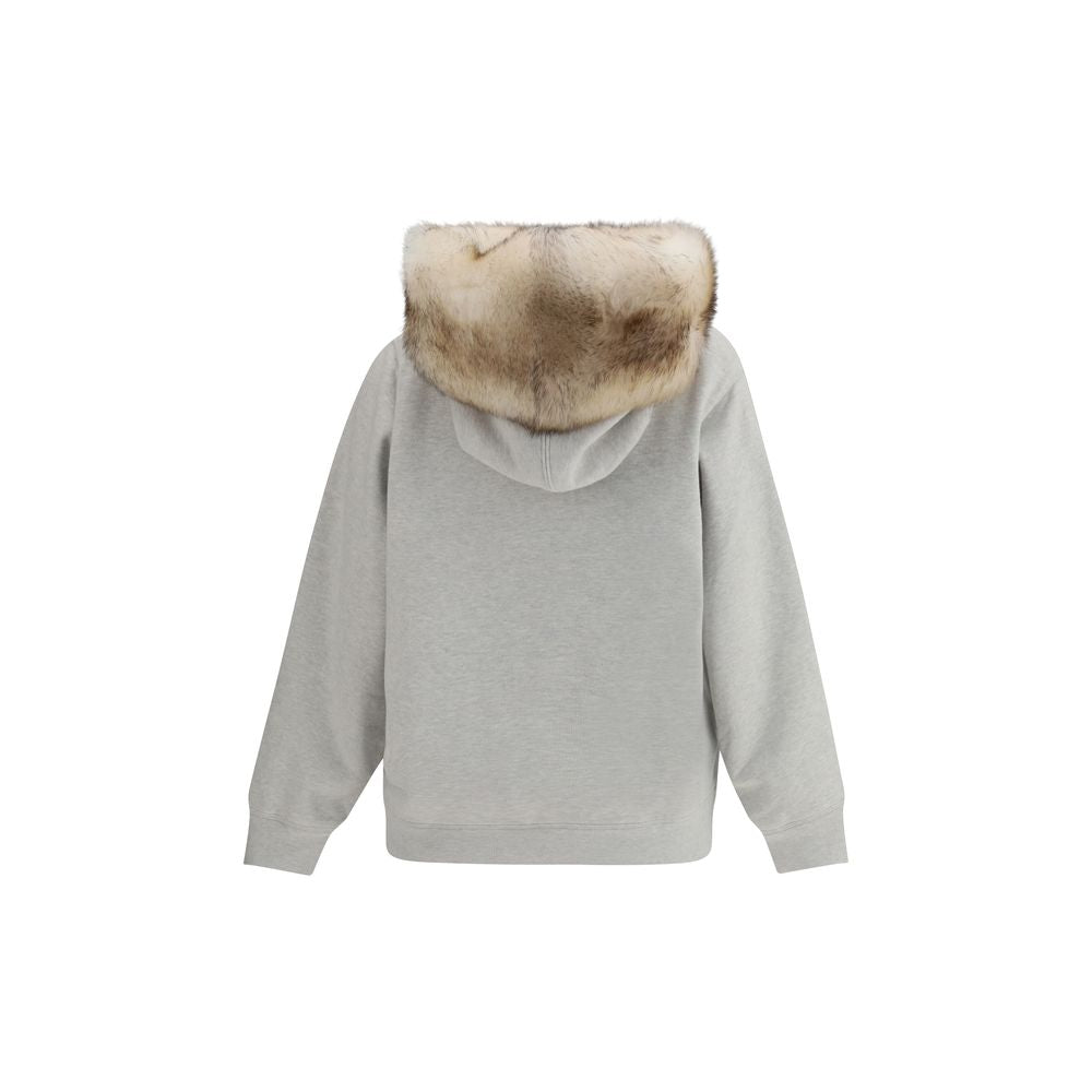 Sweat-shirt gris en coton de Prada, casual et confortable, porté sur un mannequin, vue de face avec logo discret.