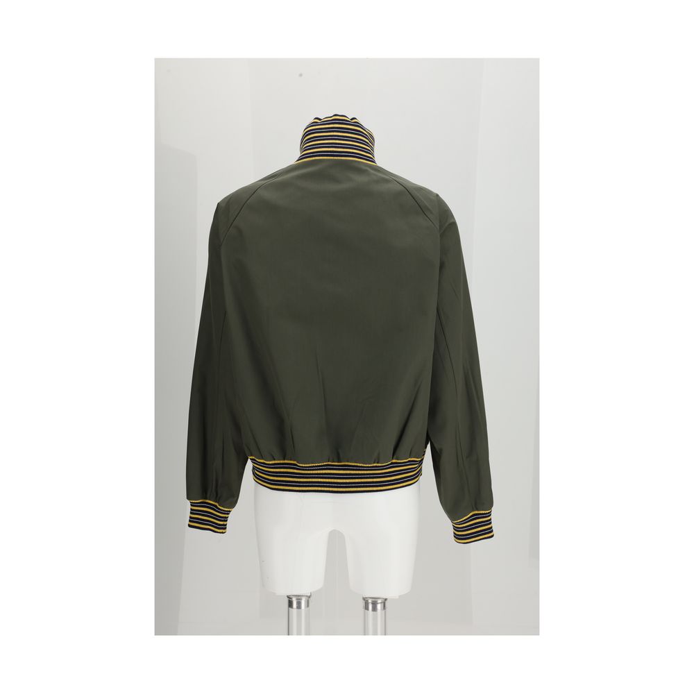 Veste bomber bicolore en polyester Prada, style moderne avec logo Prada visible sur le devant.