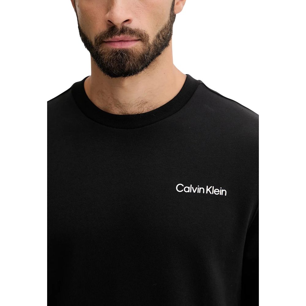 Sweatshirt en coton noir Calvin Klein Sport, vue frontale, avec logo discrètement visible, confort et style décontracté.