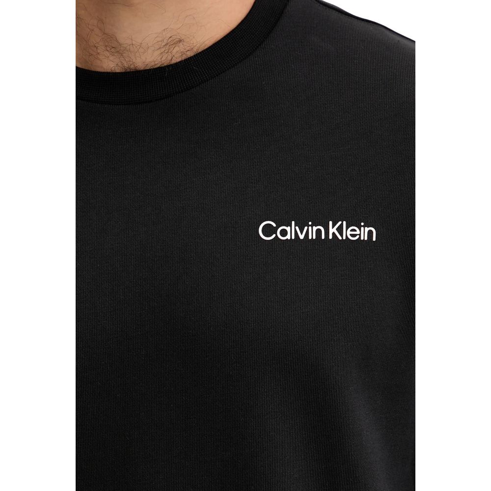 Sweatshirt en coton noir Calvin Klein Sport, style décontracté, col rond, tissu confortable, idéal pour le sport ou la détente.