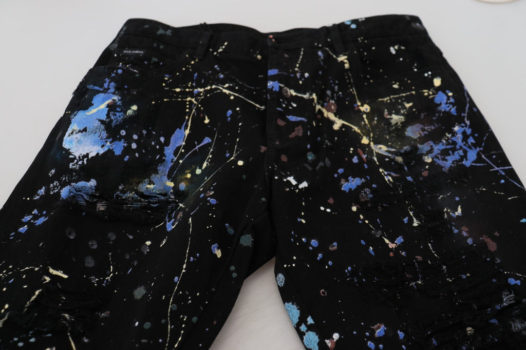 Jeans en denim noir Dolce & Gabbana avec impression colorée en coton, style décontracté et tendance.