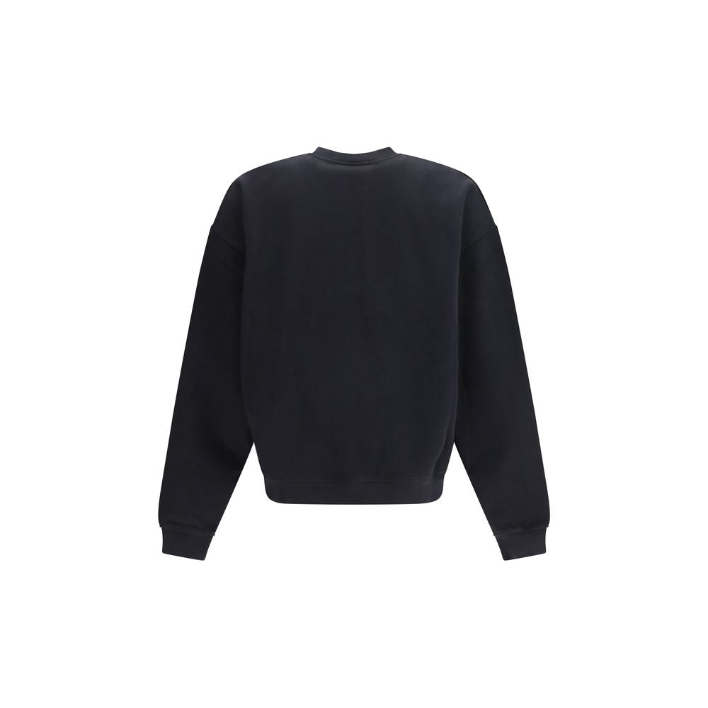 Sweat-shirt en coton noir de Dsquared², coupe décontractée et logo discret sur la poitrine, porté sur un mannequin.