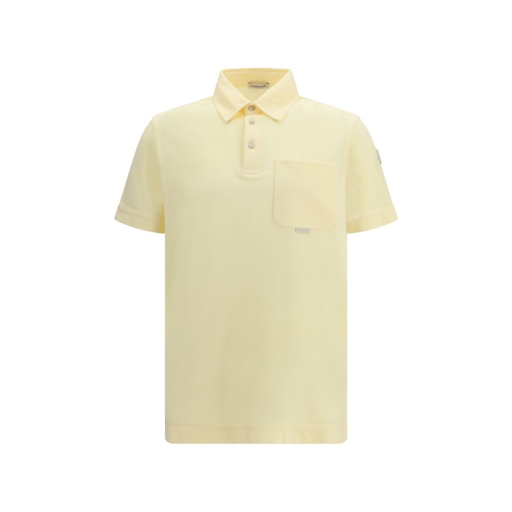 Polo en coton bicolore Moncler avec col classique et logo brodé, porté sur un mannequin.