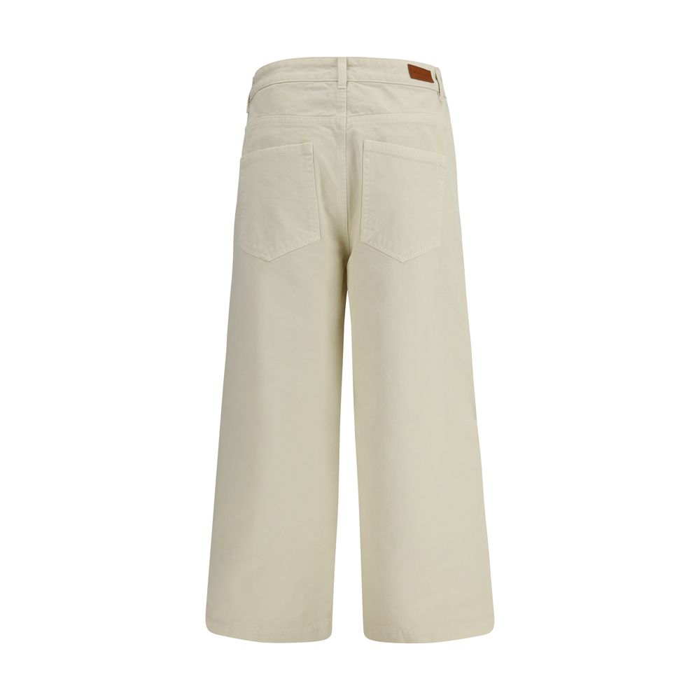 Pantalon beige en coton de style décontracté de la marque Moncler, vue de face avec détails de couture visibles.