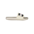 Pantoufles pour hommes Tommy Hilfiger en polyuréthane beige, confortables et élégantes, visibles sur l'image.